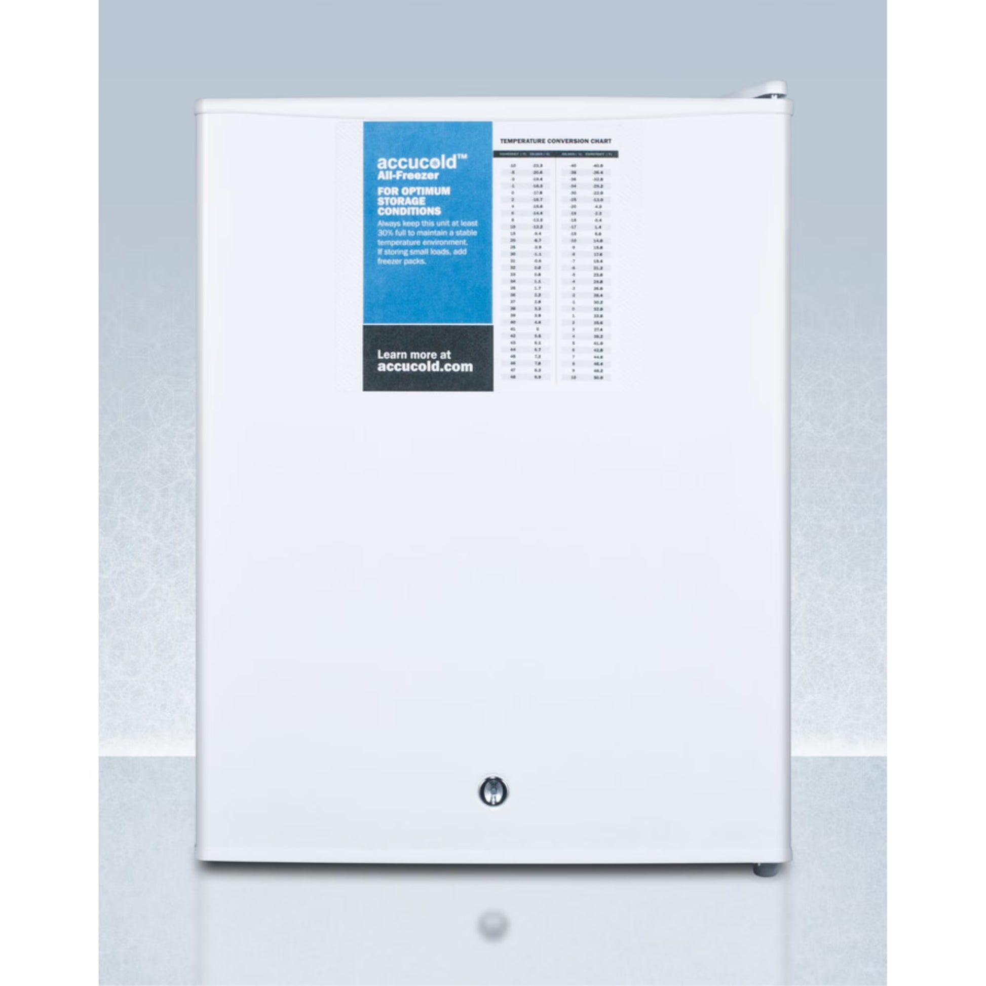 Compact manual defrost all-freezer with lock and probe hole