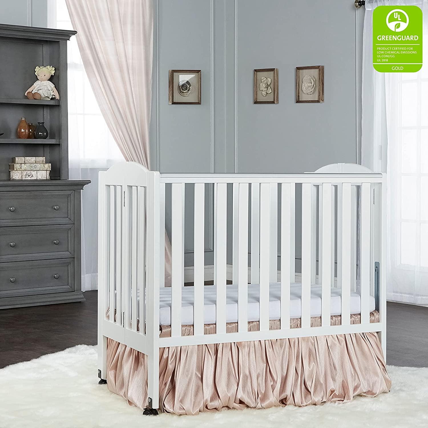 Dream On Me 2-in-1 Folding Portable Mini Crib in White. Mattress Pad Included. Easy to Fold and Store Baby Crib. Two Adjustable Mattress Height positions Convertible Crib